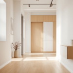Heller und einladender schmaler Flur mit Holzfußboden, moderner Beleuchtung und dezent dekorierten Wänden, das Beispiel für ein geschmackvolles Schmaler Flur renovieren.